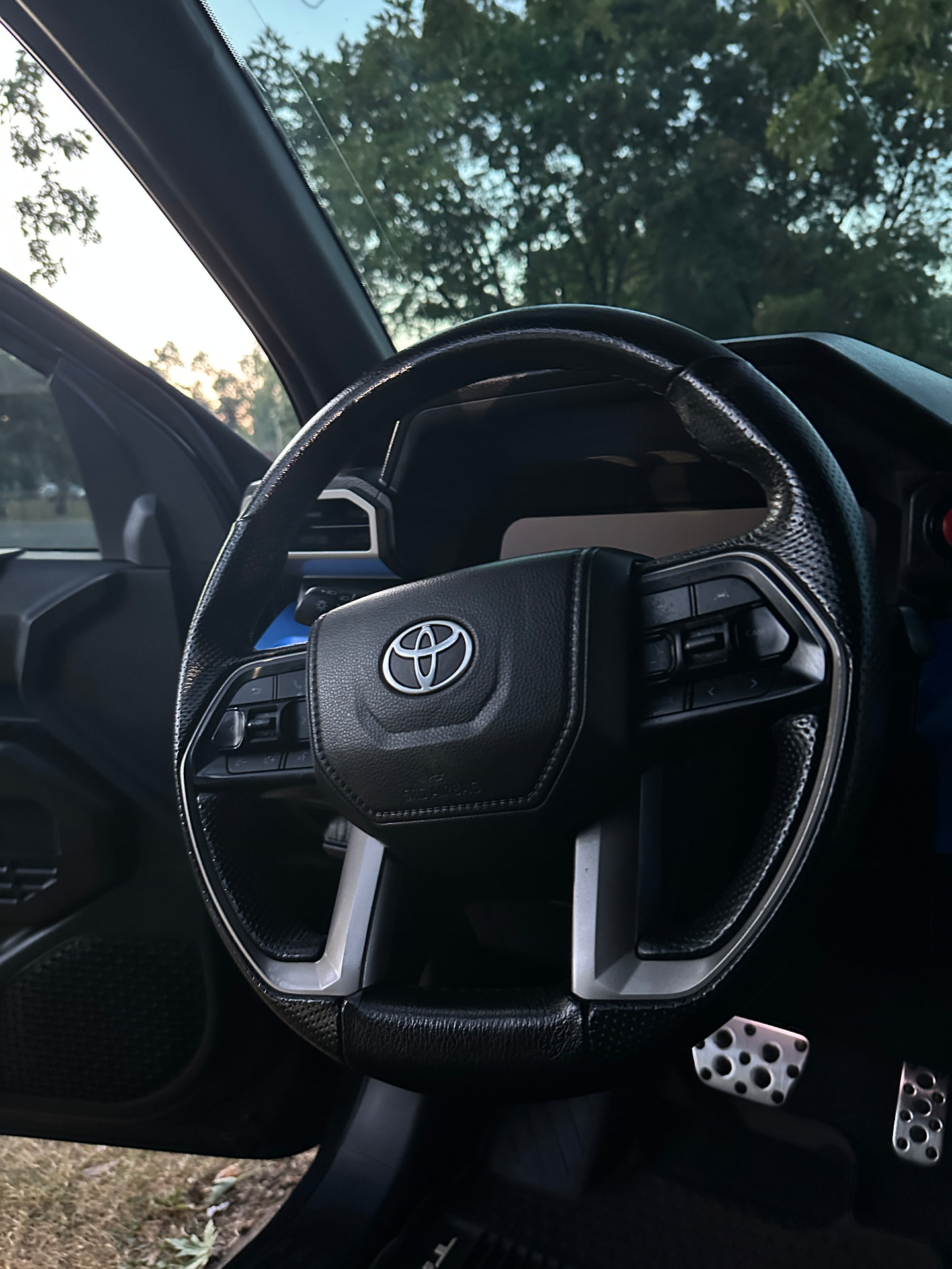 Detailed Toyota steering wheel and pedals