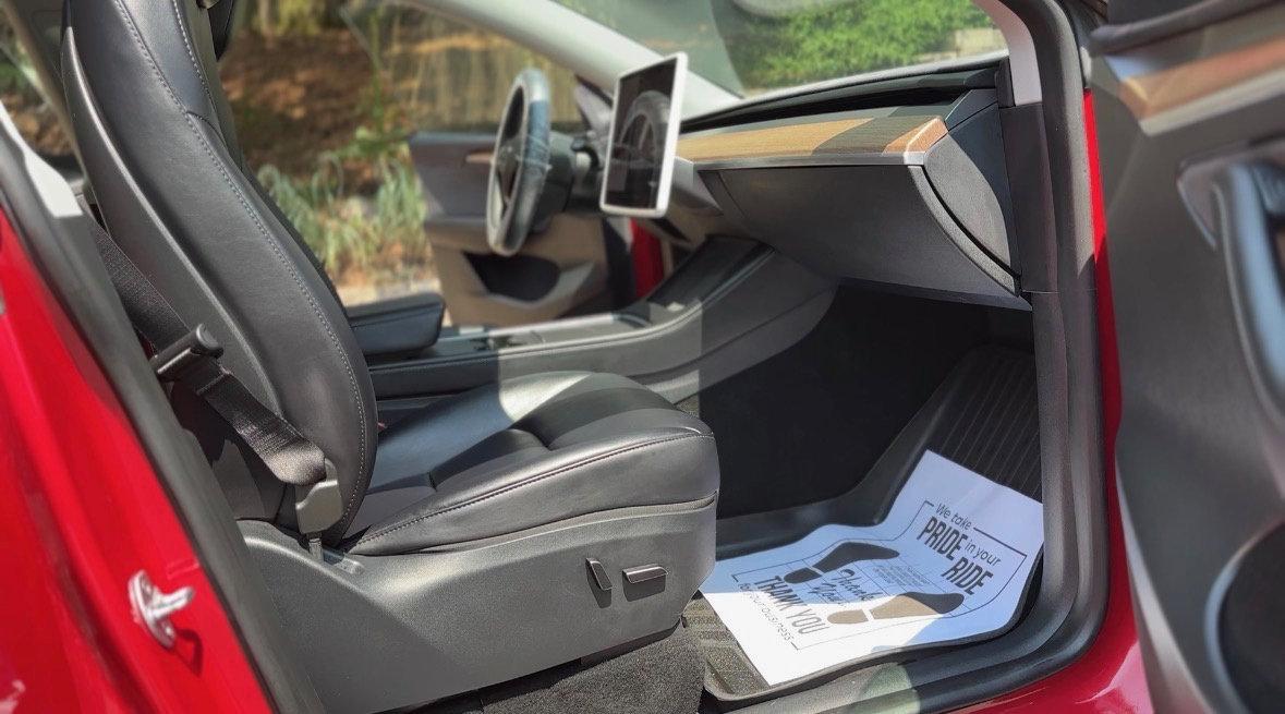 Tesla Model Y front seat and floor detailed